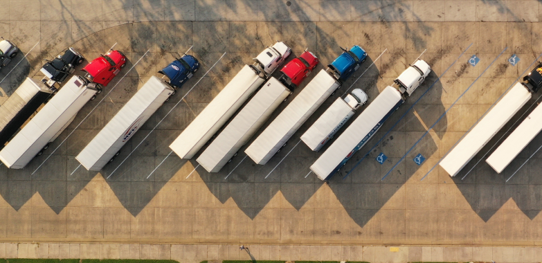 Eleven (11) semi trucks from 1,000 feet above