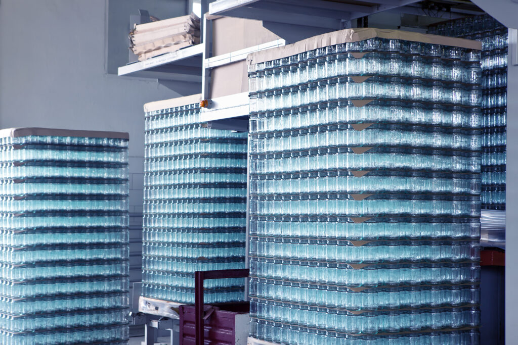 Bottles stacked up ready to be shipped - perishable goods in bottles are JIT shipping favorites