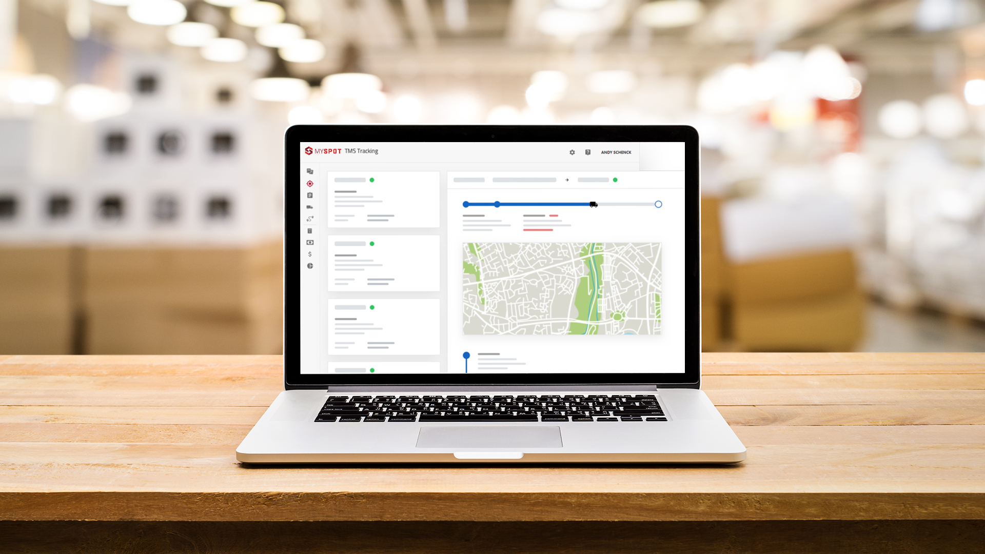Laptop open on a desk with MySpot Shippers TMS application open ont he screen.